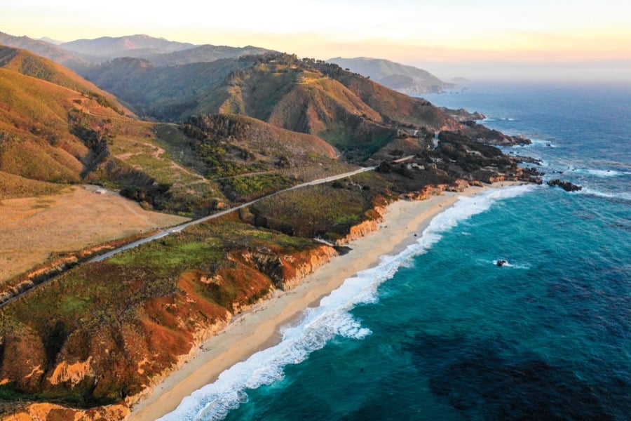 The San Diego coastline where cliffs meet a turquoise cove.